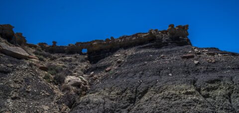 Arch On Top Of Black Hill In Bisti Wilderness, NM