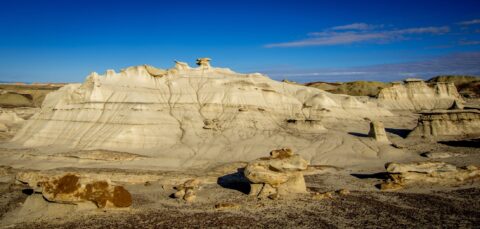 Big White Rock Surrounded With Flat Tops in Bisti Wilderness, NM