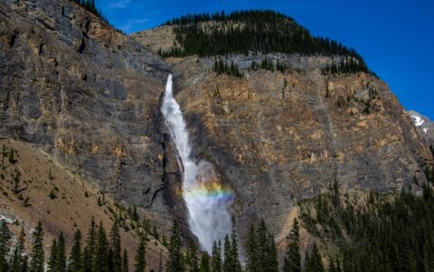 Rainbow At Magnificent Takkakaw Falls In Yoho National Park, BC