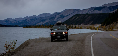 FJ On Alaska Highway Along Scenic Muncho Lake, Northern BC