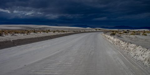 Road Covered With Sand In White Sands National Monument, NM