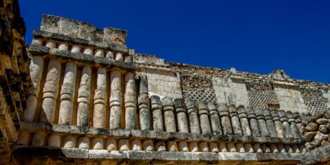 Detail Of Upper Part of Mayan Building In Uxmal Archaeological Site In Yucatan, Mexico