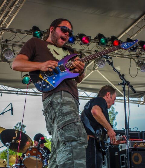 Ben Nieves Shows Emotion During His Guitar Solo On Blues Farm Stage During Heroes Of Woodstock Tour In Winthrop, WA