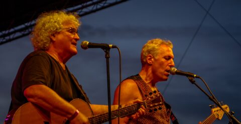 David Frieberg and Jeff Pevar As Members Of Jefferson Starship On Blues Farm Stage During Heroes Of Woodstock Tour In Winthrop, WA