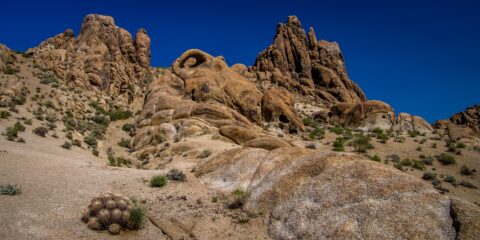 Look From Distance At Eye Of Alabama Arch In Alabama Hills, CA