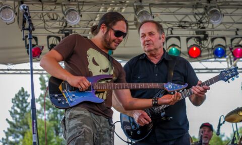 Sam Andrew Talks To Ben Nieves On Blues Farm Stage During Heroes Of Woodstock Tour In Winthrop, WA