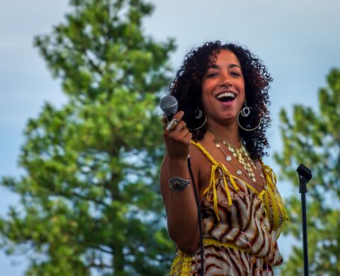 Sophia Ramos Enjoys While Crowd Sing Along During Blues Farm Performing At Heroes Of Woodstock Tour In Winthrop, WA