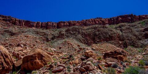 Scrambling Between Esplanade And Surprise Valley Below In Grand Canyon National Park, AZ