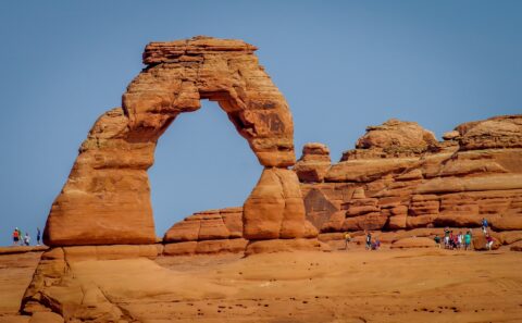 Tourists Around Delicate Arch In Arches National Park, Moab, UT