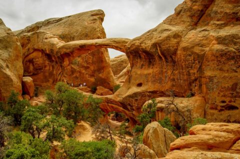 Visitors At Double O Arch In Devils Garden, Arches National Park, Moab, UT