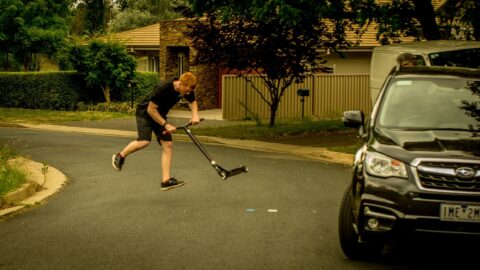 Damjan Demonstrates His Scooter Skills On The Street In Canberra, ACT, Australia