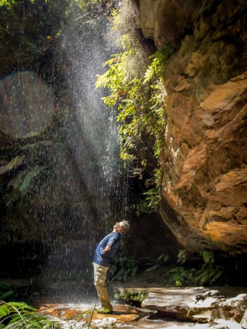 rrasha Cools Down Under Waterfall On The Grand Canyon Trail, Blue Mountains, NSW, Australia