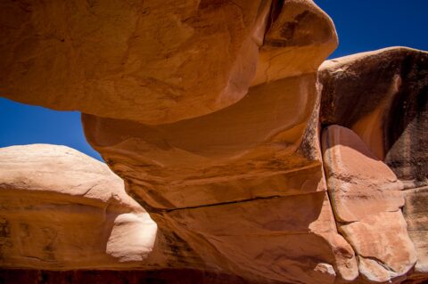 Enjoy In Shadow Of Massive Mano Arch In Devils Garden, Grand Staircase Escalante National Monument, UT