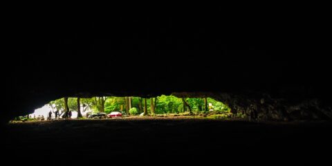 Manini-holo Dry Cave, look towards Ha’ena Beach, North Shore of Kauai Island, HI