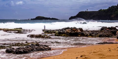 Photographer Challenges Waves, Secret Beach, North Shore of Kauai Island, HI