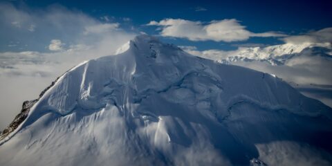 Top Of Mt Sannikov Above Clouds In Kluane National Park, YT