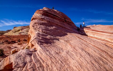 Some Have Urge To Climb On Top Of Everything They See, Fire Wave In Valley Of Fire State Park, NV