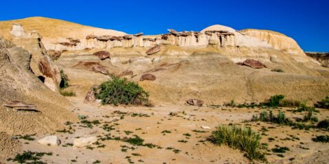 Hiking Beside Chocolate Mushroom Hoodoos In Ah-Shi-Sle-Pah Wilderness Study Area, NM