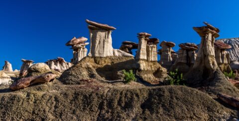 Look From Valley At Chocolate Mushroom Hoodoos In Ah-Shi-Sle-Pah Wilderness Study Area, NM