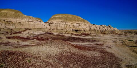Soil Covered By Red Shale And Olive Colored Hills In Ah-Shi-Sle-Pah Wilderness Study Area, NM