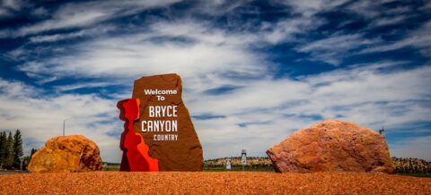 Sign on Scenic Byway 12 At intersection With Road Leading To Bryce Canyon National Park, UT