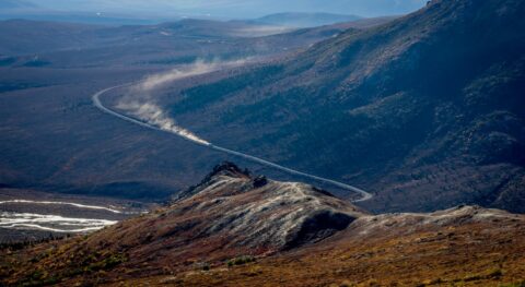 Dust Trail After Tour Bus In Denali National Park, AK