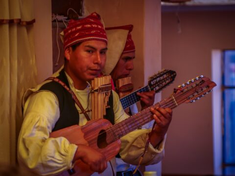 Live Music During Lunch Time In Local Family House On Isla Taqile, Lake Titicaca, Peru