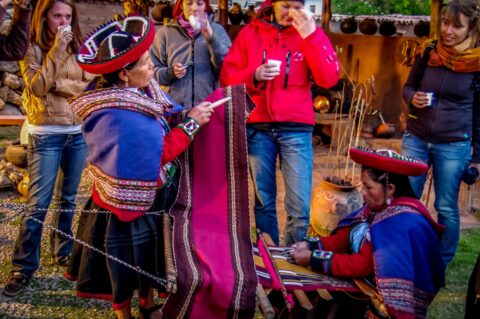 Quechua women demonstrate hands weaving, Chinchero, Sacred Valley, Peru
