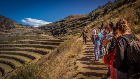 Guide Explains History Of Inca Ruins Near Pisac, Sacred Valley, Peru