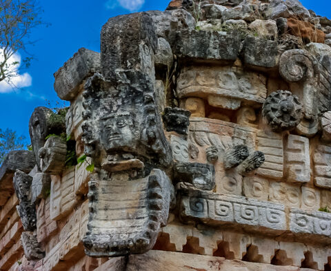 Figure At The Corner Of Mayan Building On Xlapak Archaeological Site In Yucatan, Mexico