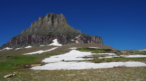 Snow Remains On The Ground Over Summer At  Logan Pass, Glacier National Park, MT