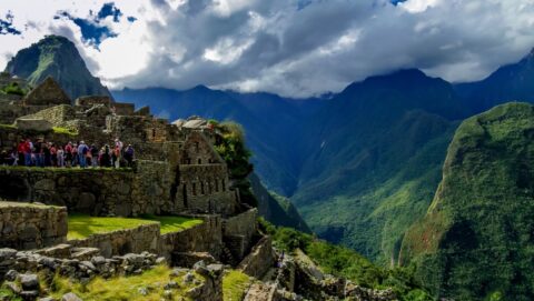 Tourists On Machu Picchu Archaeological Site, Peru