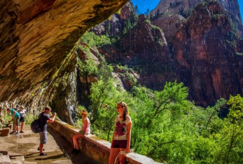 Tourists Pose At Weeping Rock, Zion National Park, UT