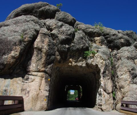 Zoom-Zoom & Presidents on Mount Rushmore on The Other Side Of Tunnel In Black Hills, SD