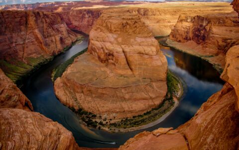 Boat At Horseshoe Bend Of The Colorado River Near Page, AZ